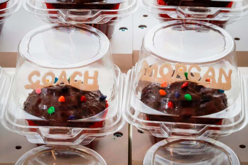 a group of plastic containers with food in them