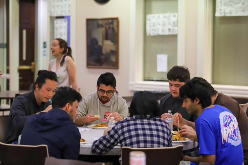 a group of people eating at a table