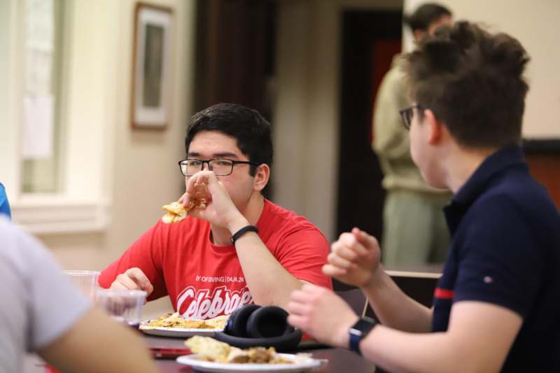 a group of people eating food