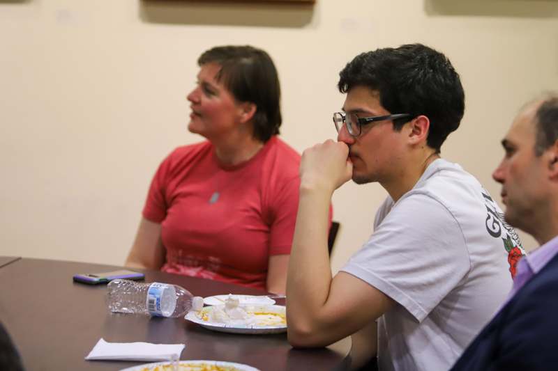 a man and woman sitting at a table