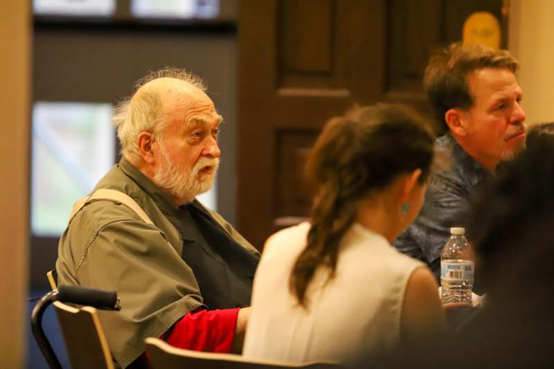 a group of people sitting in chairs