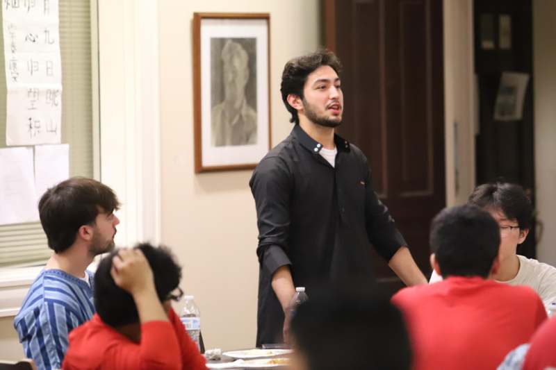 a man standing in front of a group of people