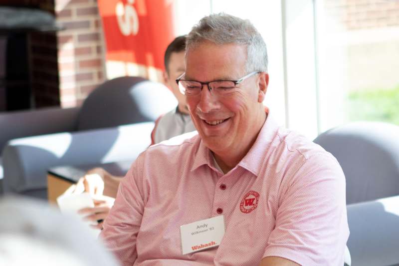 a man wearing a name tag
