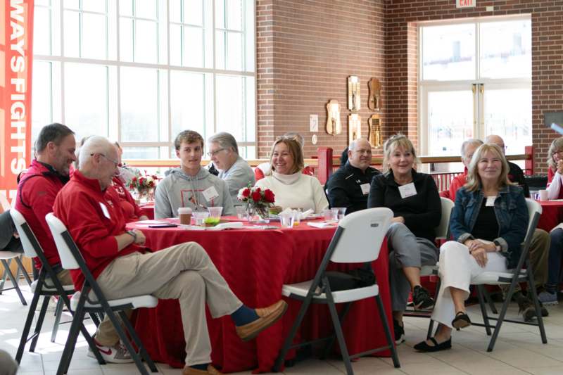 a group of people sitting at a table