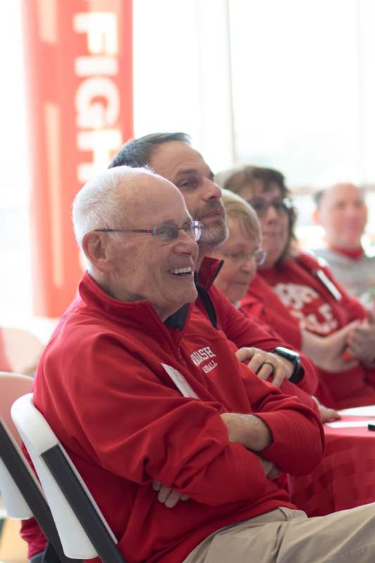 a group of people sitting in chairs