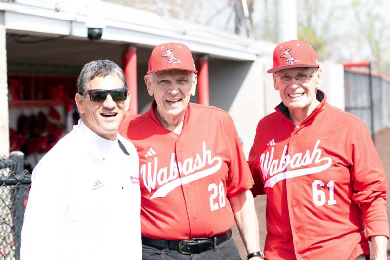 a group of men wearing baseball uniforms
