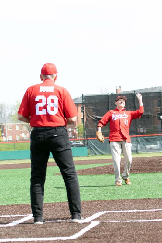 a man throwing a baseball