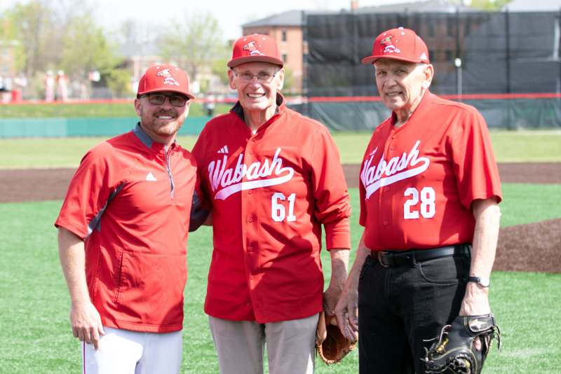 a group of men wearing baseball uniforms