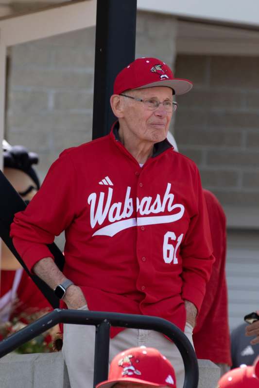 an old man in a red uniform