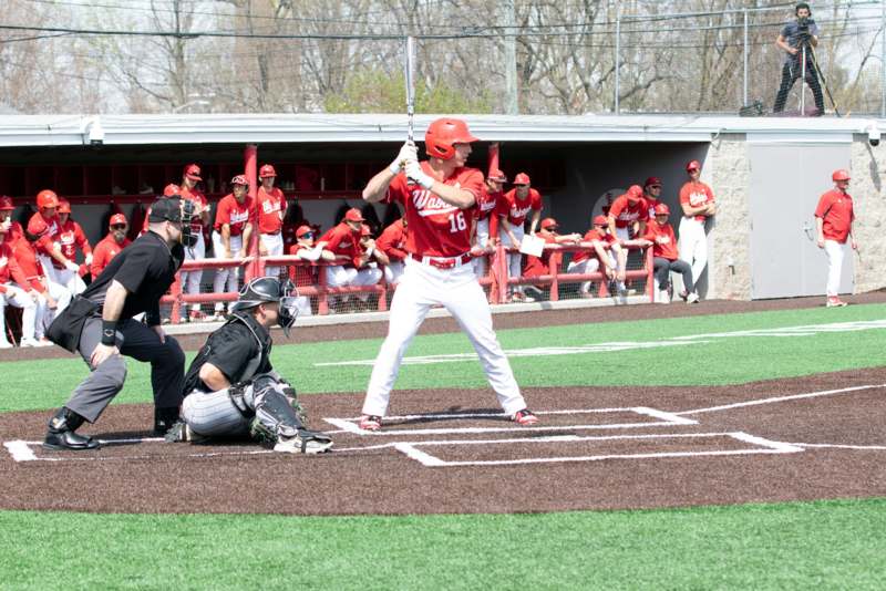 a baseball player holding a bat