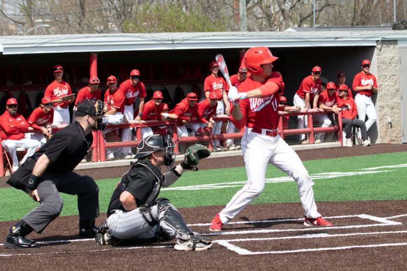 a baseball player holding a bat