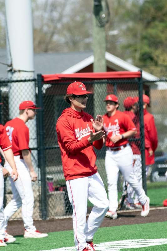 a baseball player in red uniform