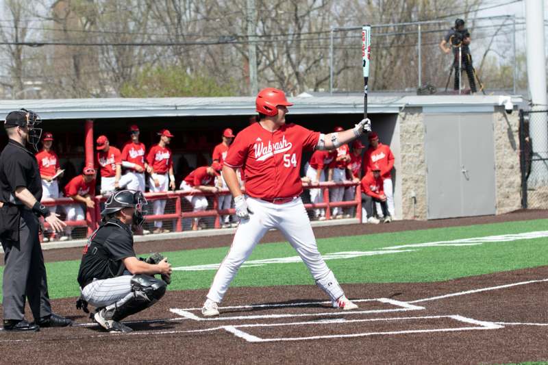 a baseball player holding a bat