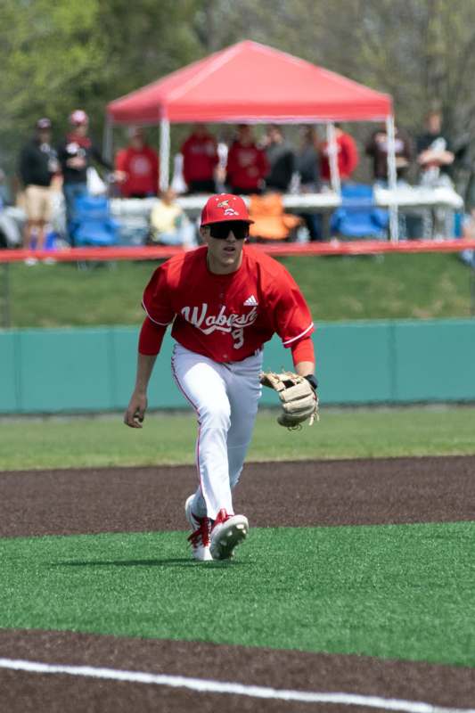 a baseball player running on a field