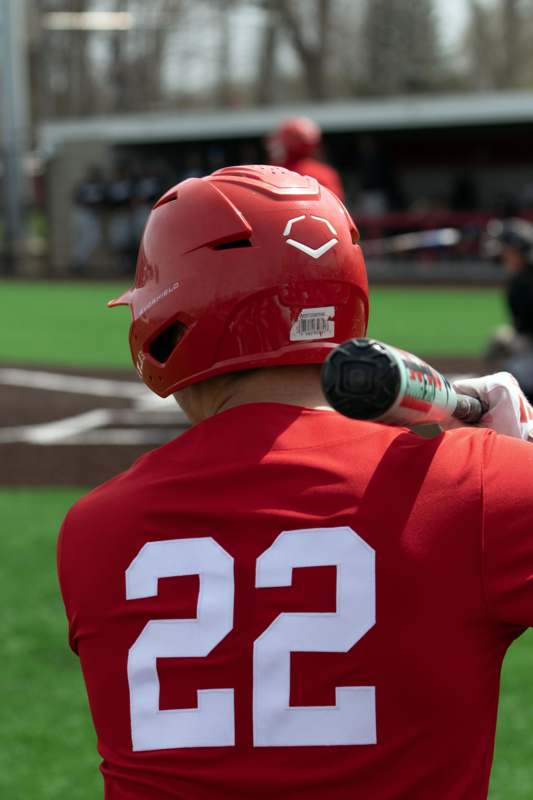 a baseball player holding a bat