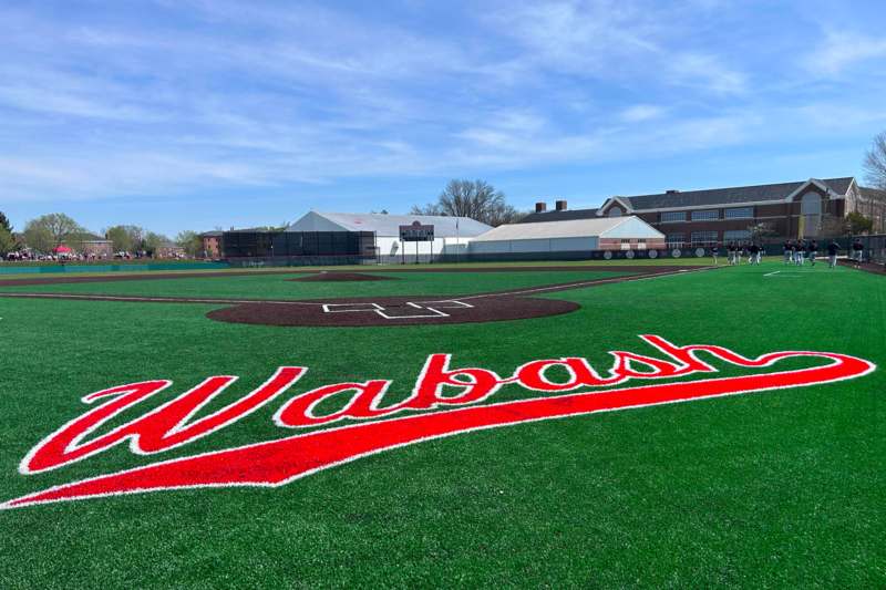a baseball field with a logo on it
