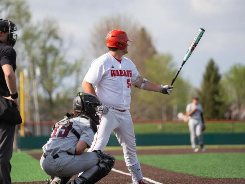 a baseball player holding a bat