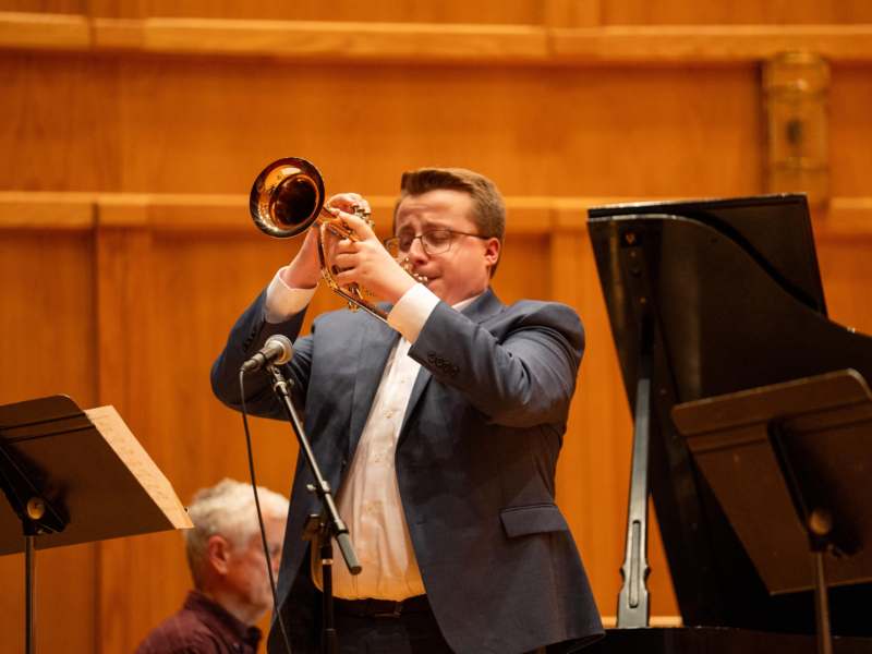 a man playing a trumpet