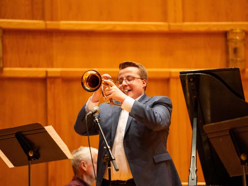 a man playing a trumpet