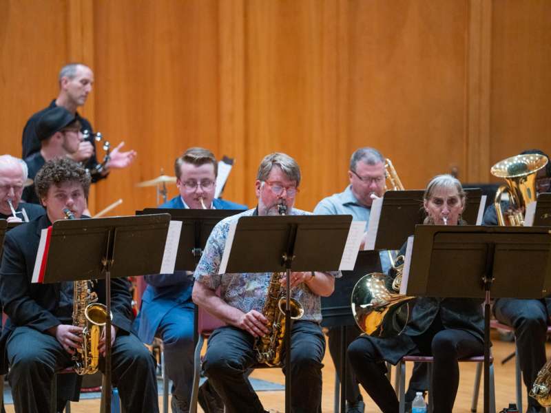a group of people playing instruments