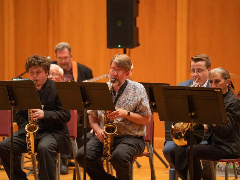 a group of people playing instruments