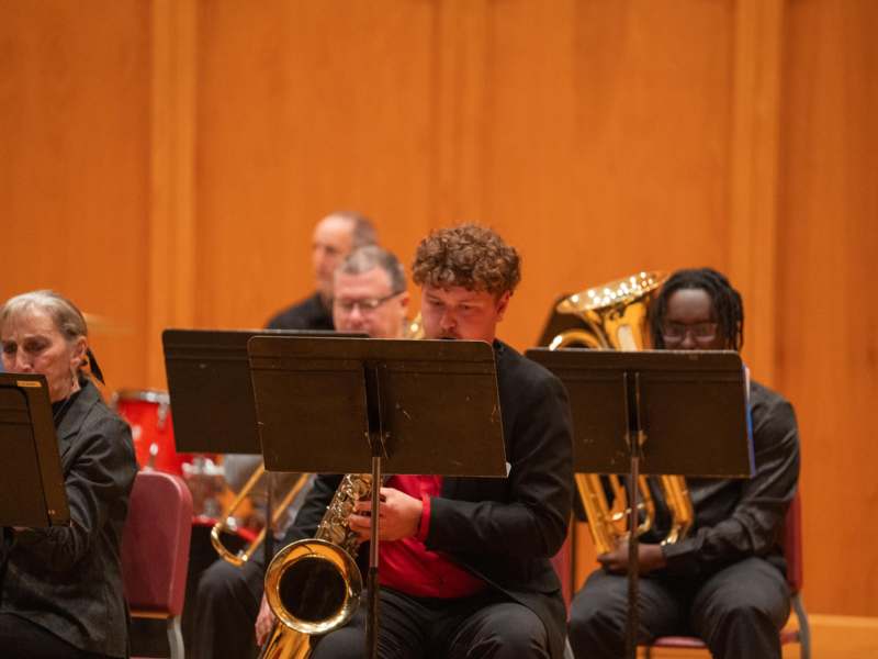 a group of people playing instruments