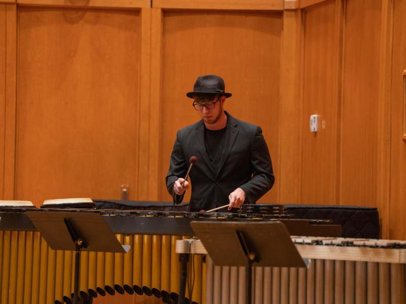 a man playing a xylophone