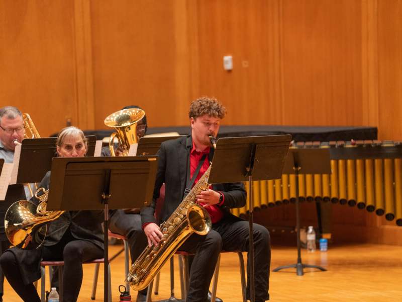 a man playing a saxophone