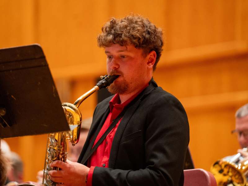 a man playing a saxophone