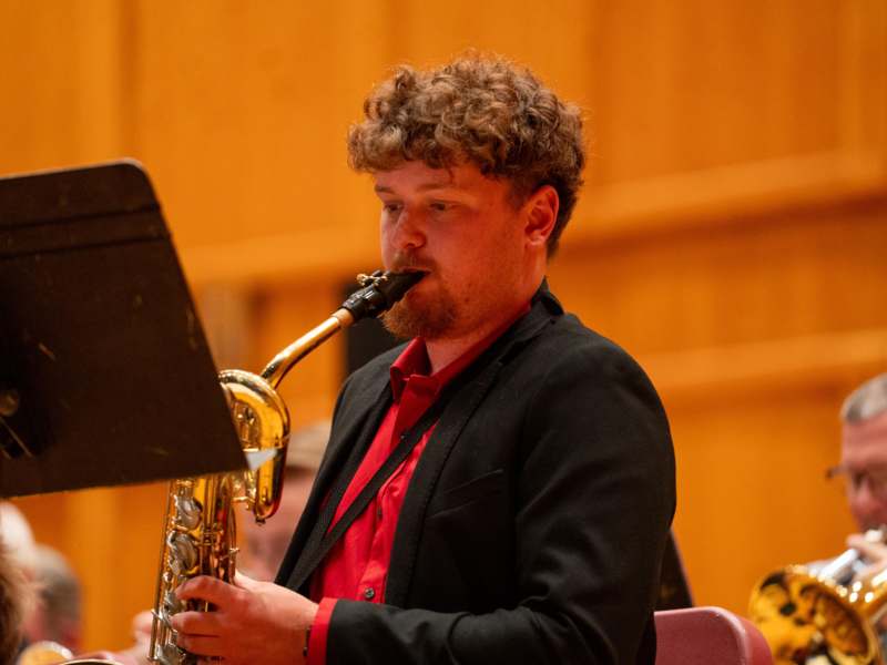 a man playing a saxophone