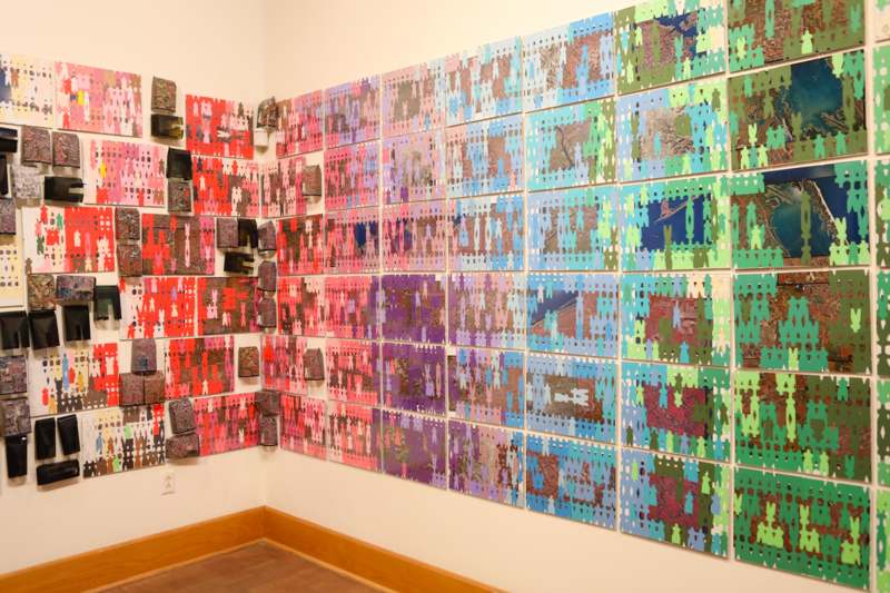 a wall with many pieces of puzzle pieces