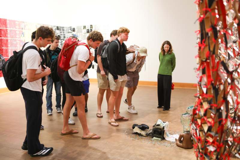 a group of people standing in a room