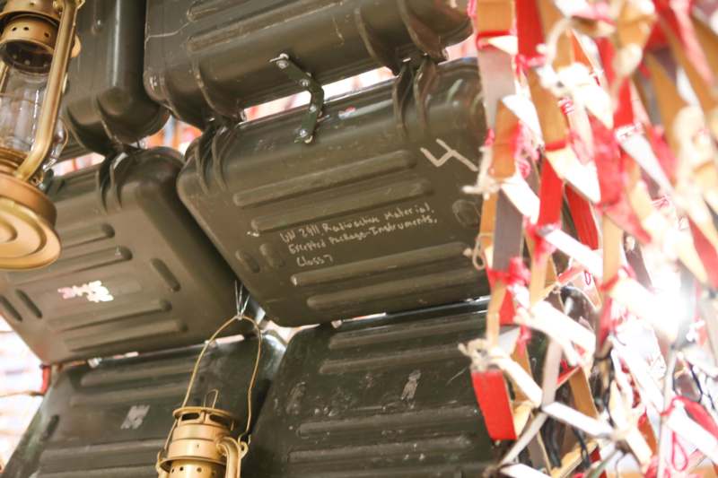 a group of green metal containers