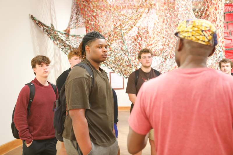 a group of people standing in a room