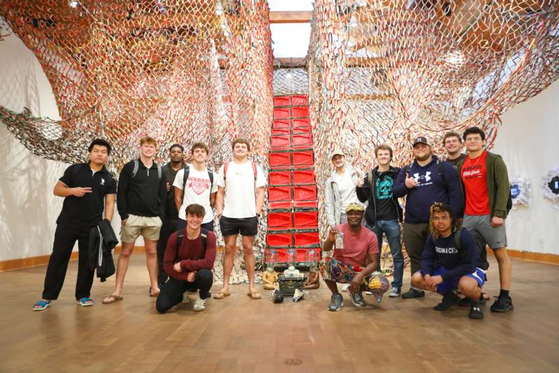 a group of people posing for a photo