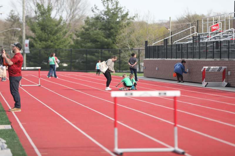 people on a track with people on it