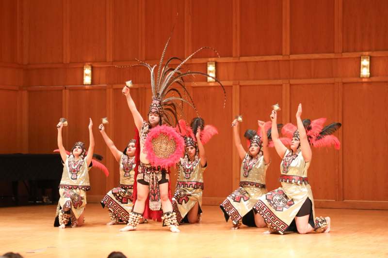 a group of people in clothing on a stage