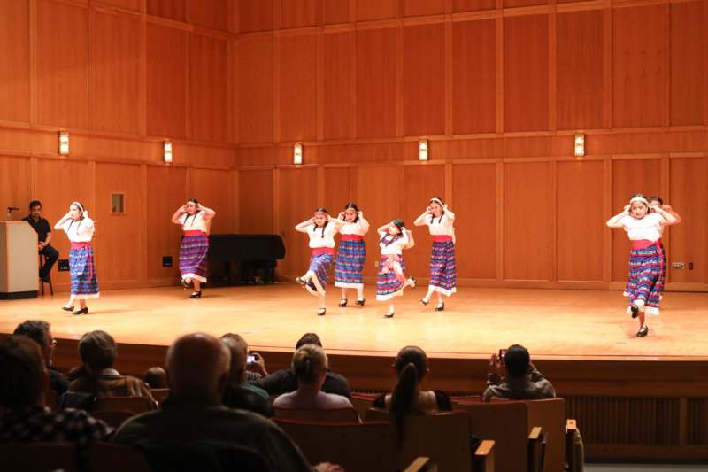 a group of girls on a stage