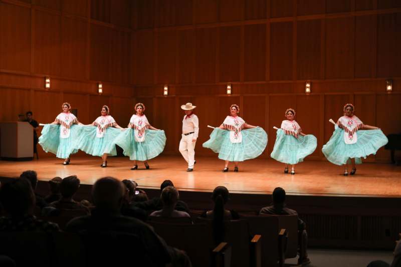 a group of people on a stage