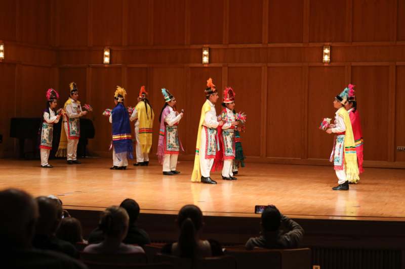 a group of people on a stage