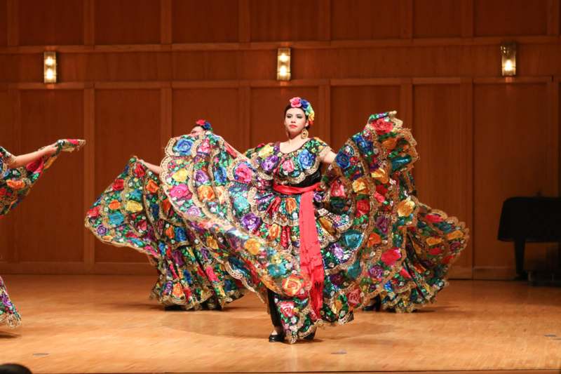 a woman in a colorful dress