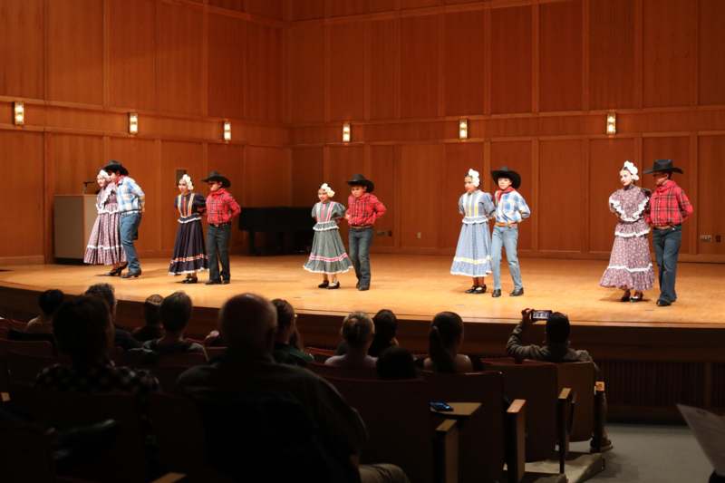 a group of people on a stage