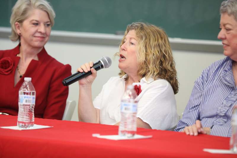 a group of women sitting at a table