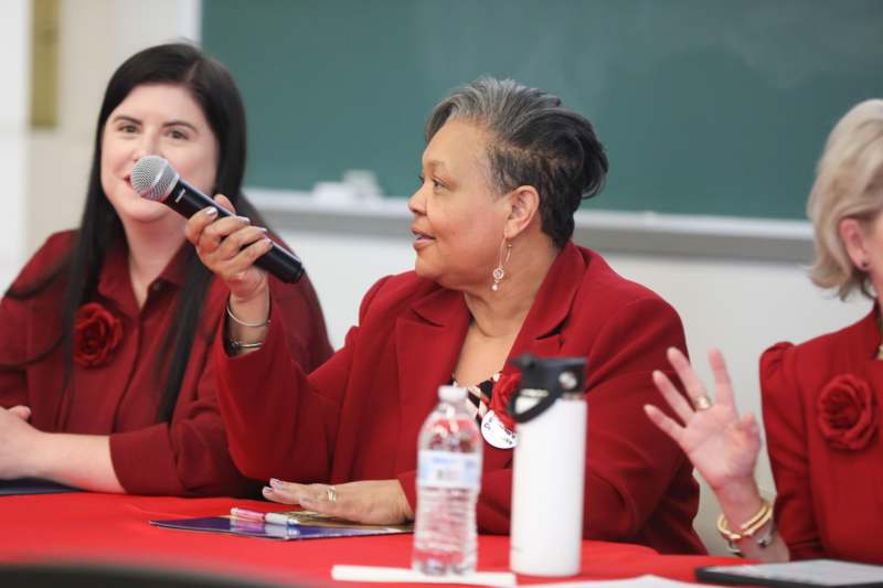 a woman holding a microphone