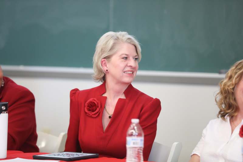 a woman in a red suit