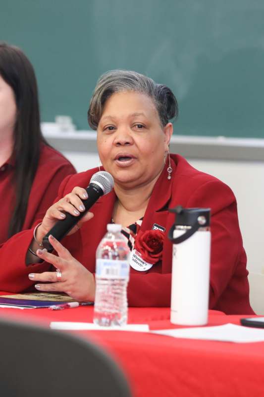 a woman holding a microphone
