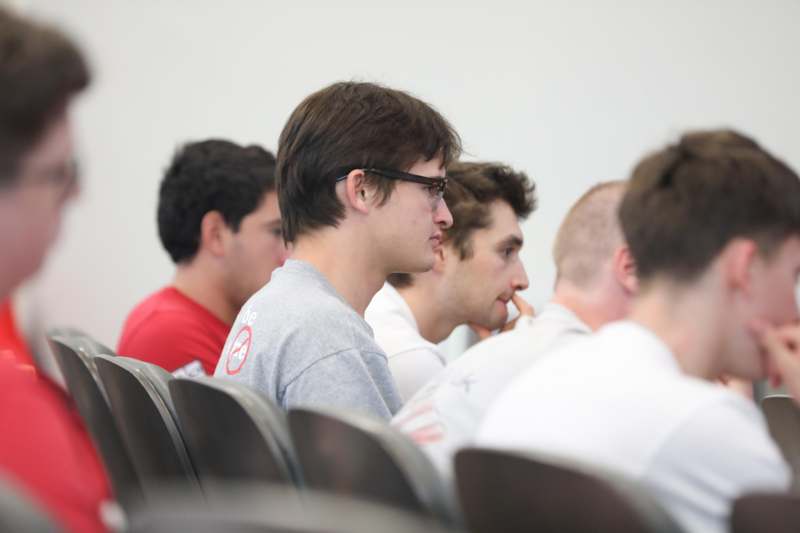 a group of people sitting in a room