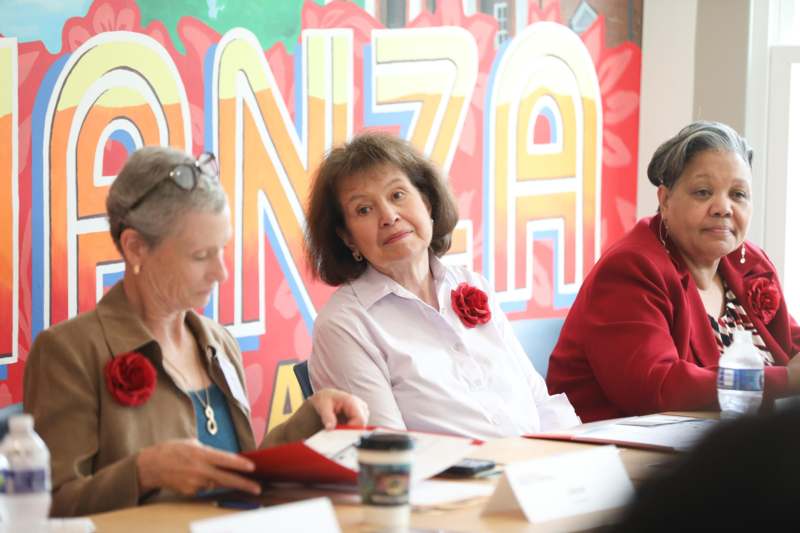 a group of people sitting at a table