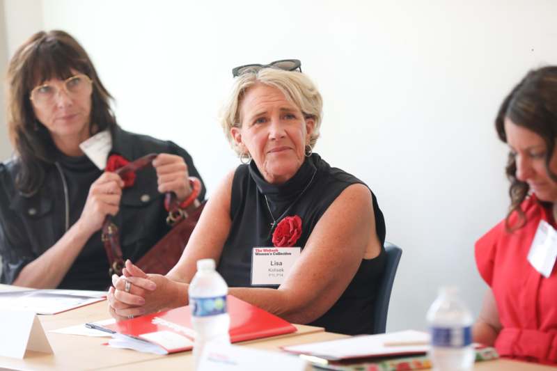 a woman sitting at a table