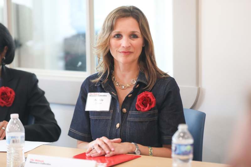 a woman sitting at a table